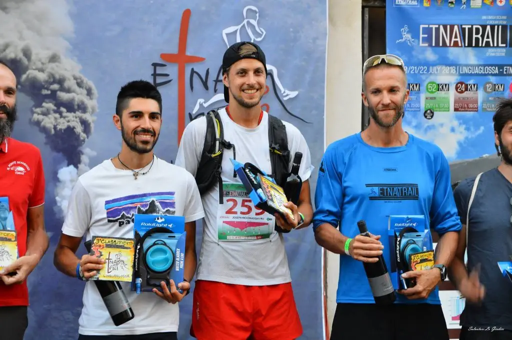 Joe accepting an award at the Mt. Etna 50k